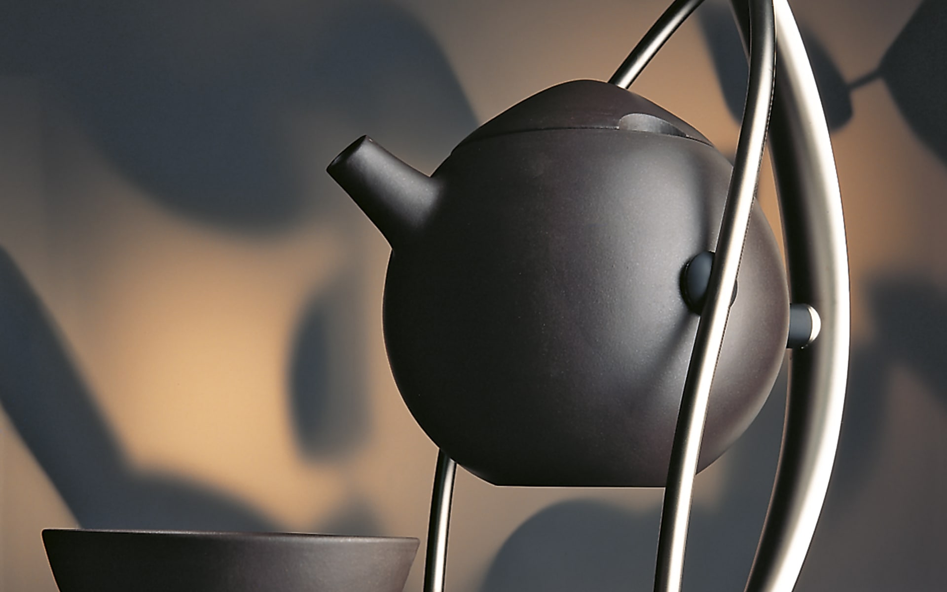 Tea set No 1 for ITO Originals, made of black-brown ceramics and metal, created in 1993