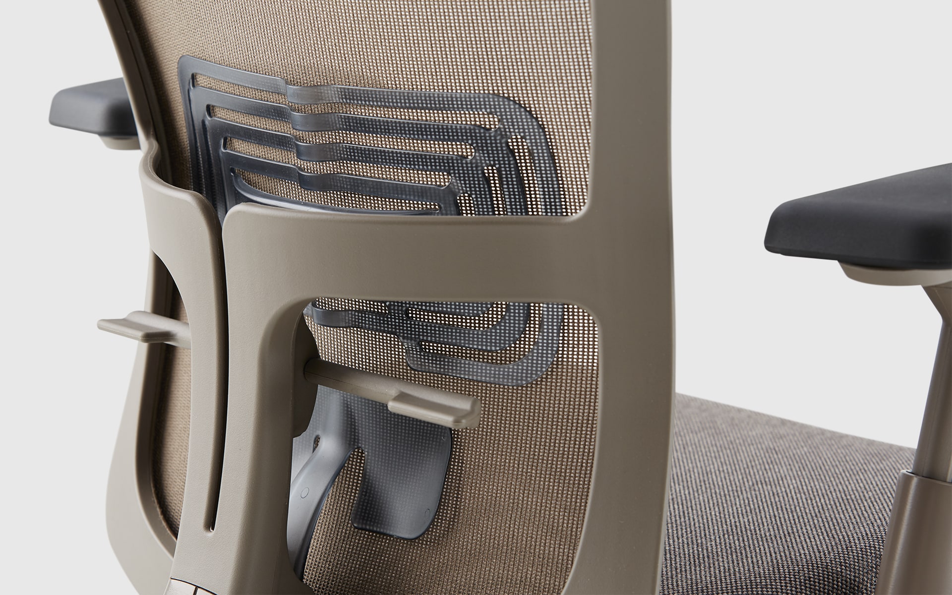 Close-up of the ergonomic backrest of the Haworth Zody office chair by ITO Design
