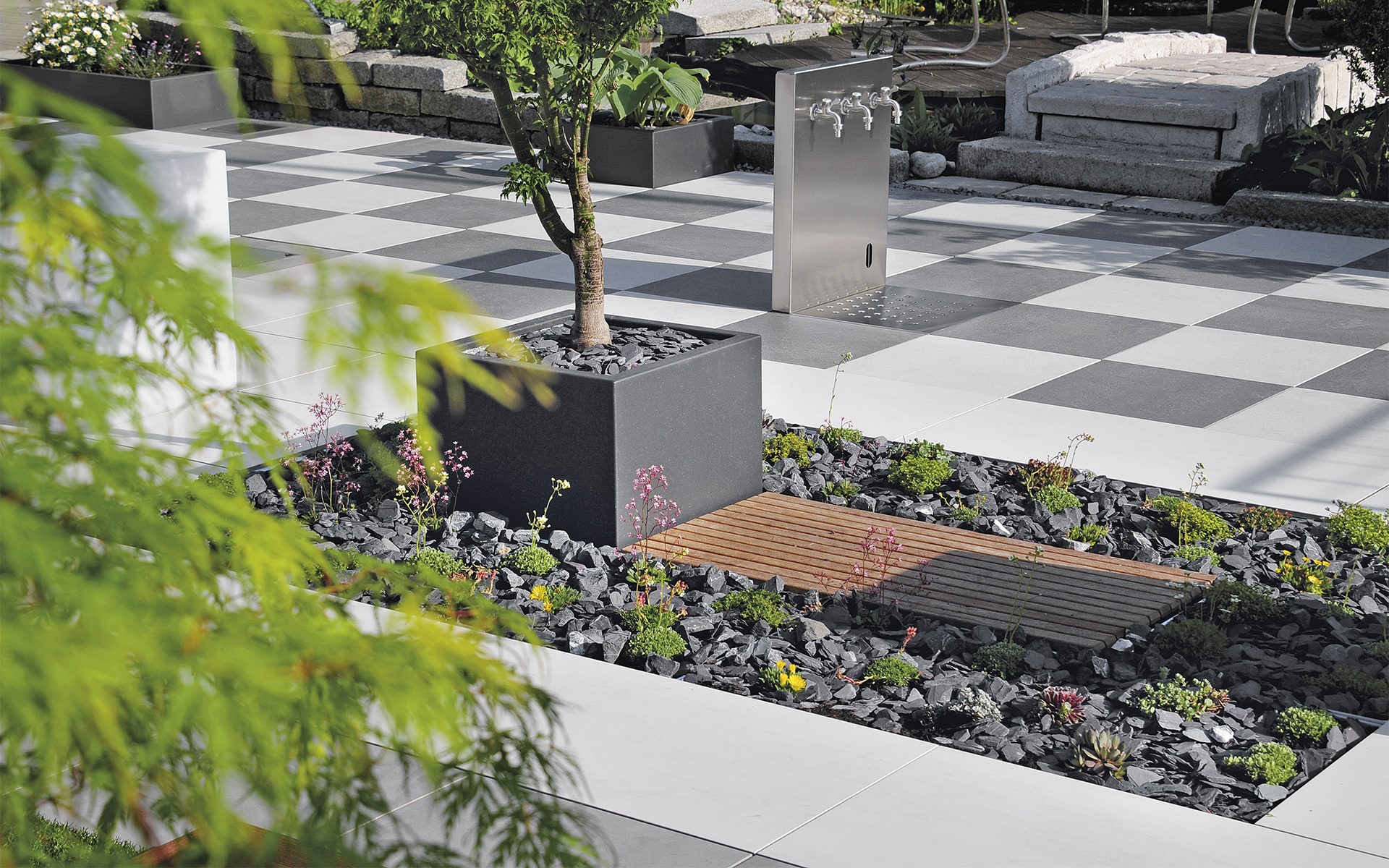 Modular terrace system Sunderra Scape by ITO Design with faucets and planting