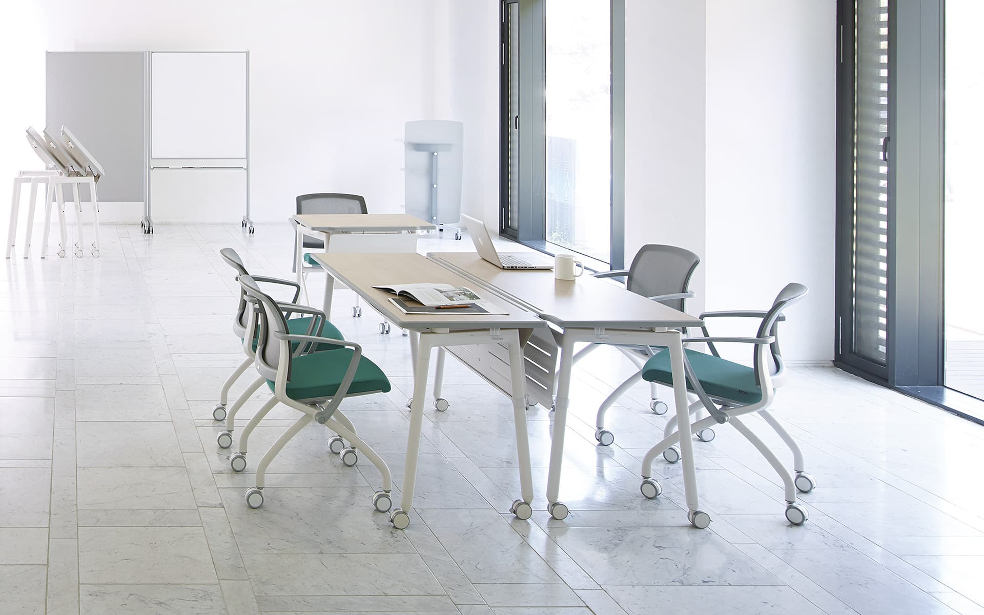 Collaborative table system Fursys Align by ITO Design in bright room