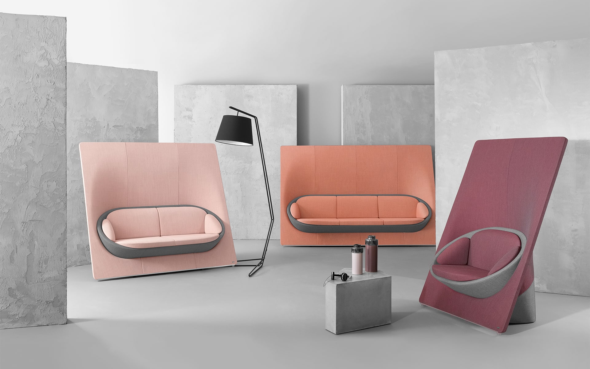 Various models of the Profim Wyspa lounge seating system by ITO Design in dusky pink, salmon and berry