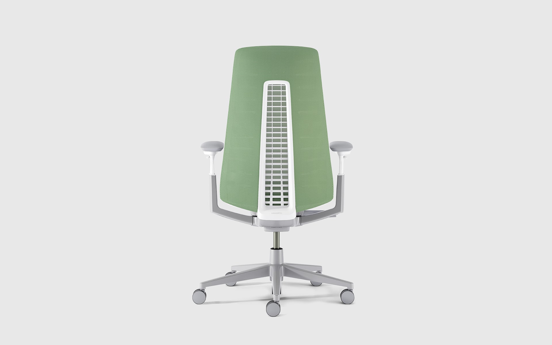 Haworth Fern office chair by ITO Design with green backrest whose functionality is inspired by the structure of a fern