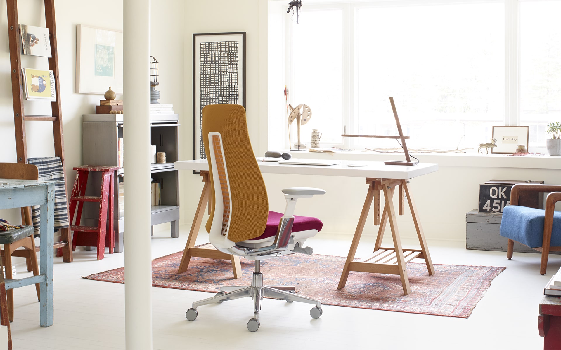 Haworth Fern office chair by ITO Design with brown backrest and hot pink upholstery in bright home office