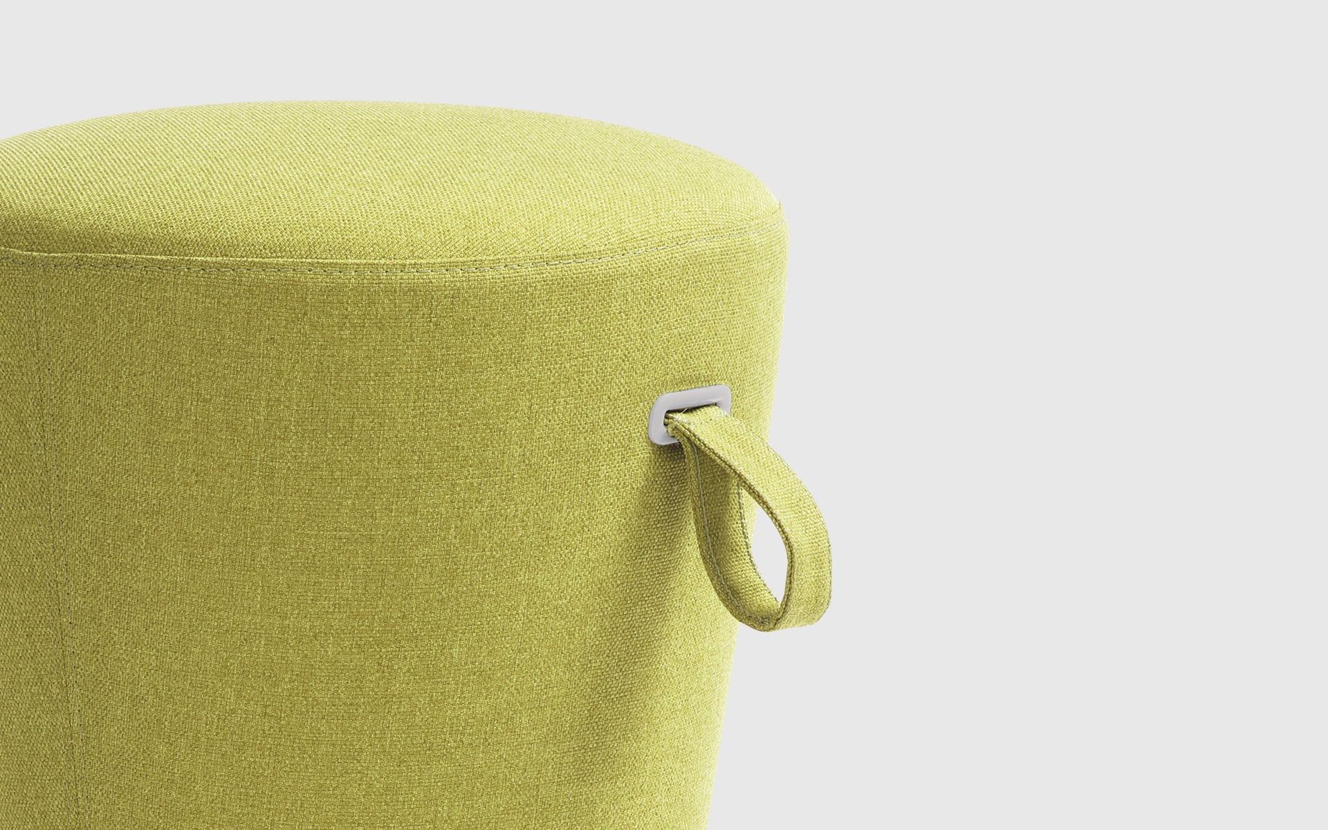 Close-up of the Profim Mickey stool by ITO Design with yellow green upholstery