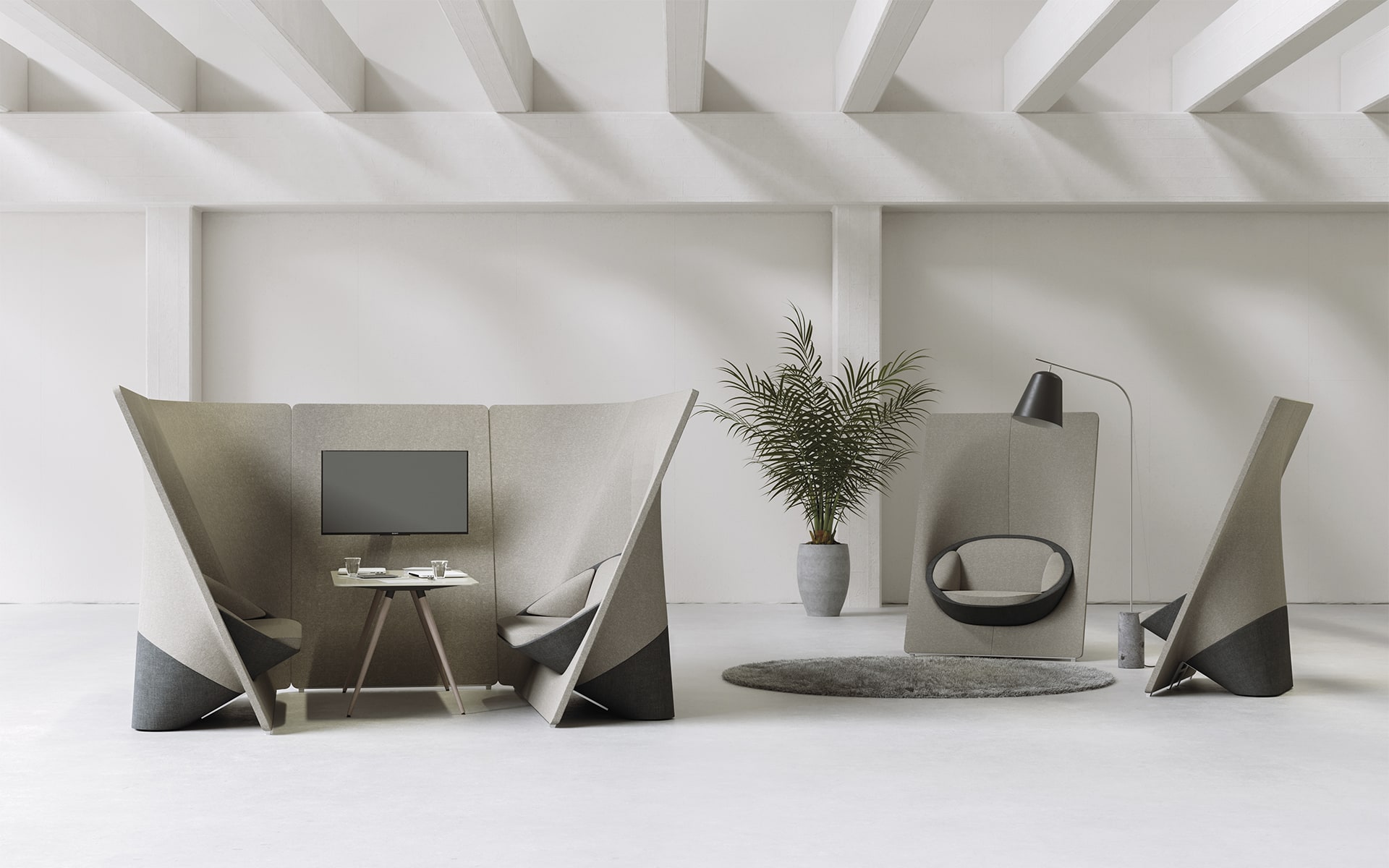 Beige Profim Sam table by ITO Design stands in the middle of taupe Profim Wyspa lounge system by ITO Design