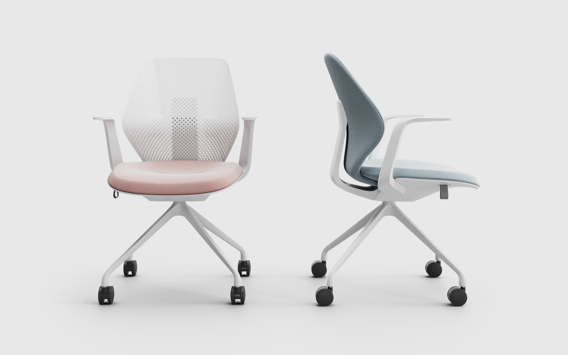 Two white ITOKI QuA office chairs by ITO Design with pink and blue