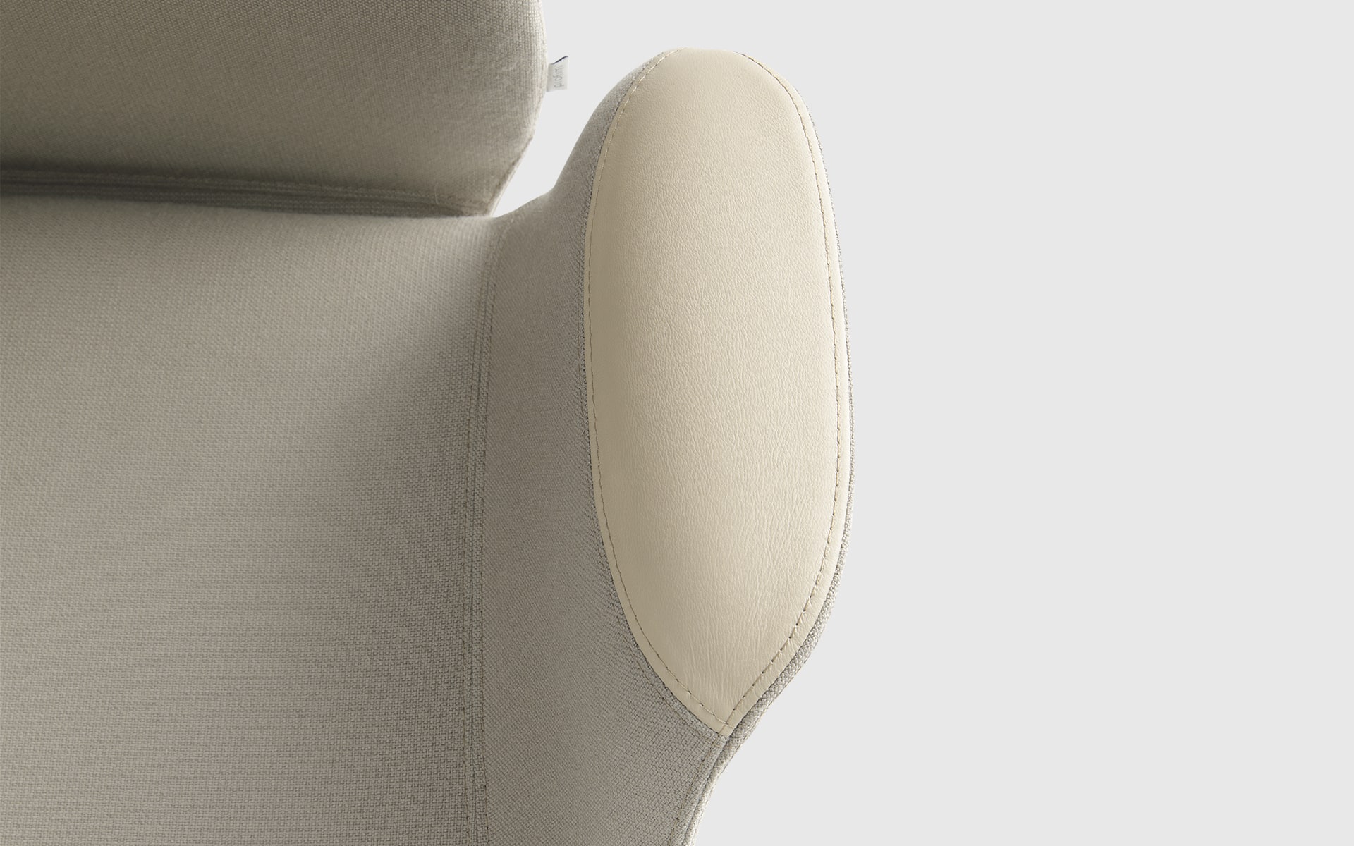 Detailed view of a cream-coloured Profim Ellie chair by ITO Design