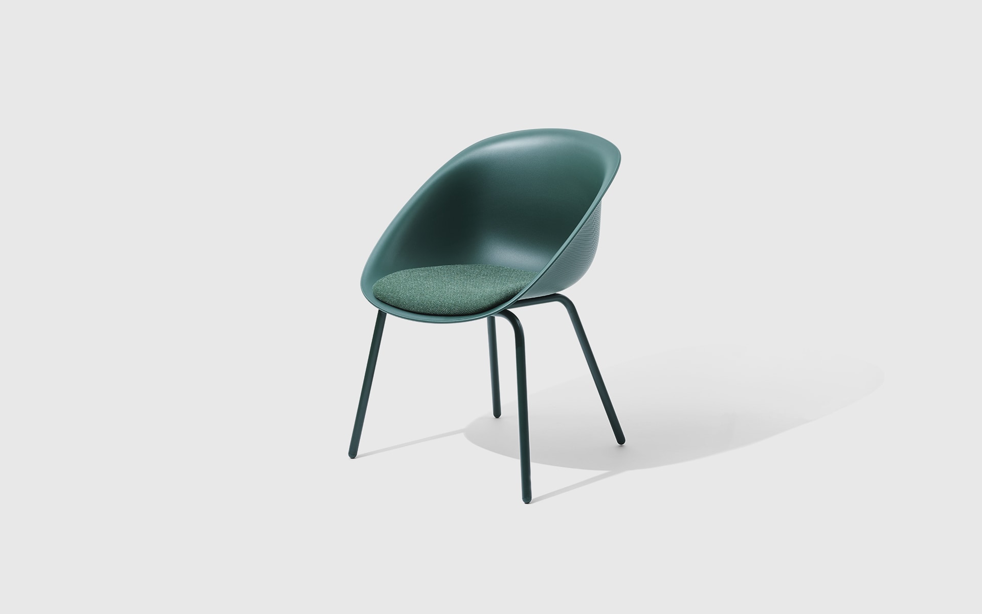 The ITOKI Wan shell chair by ITO Design in dark green