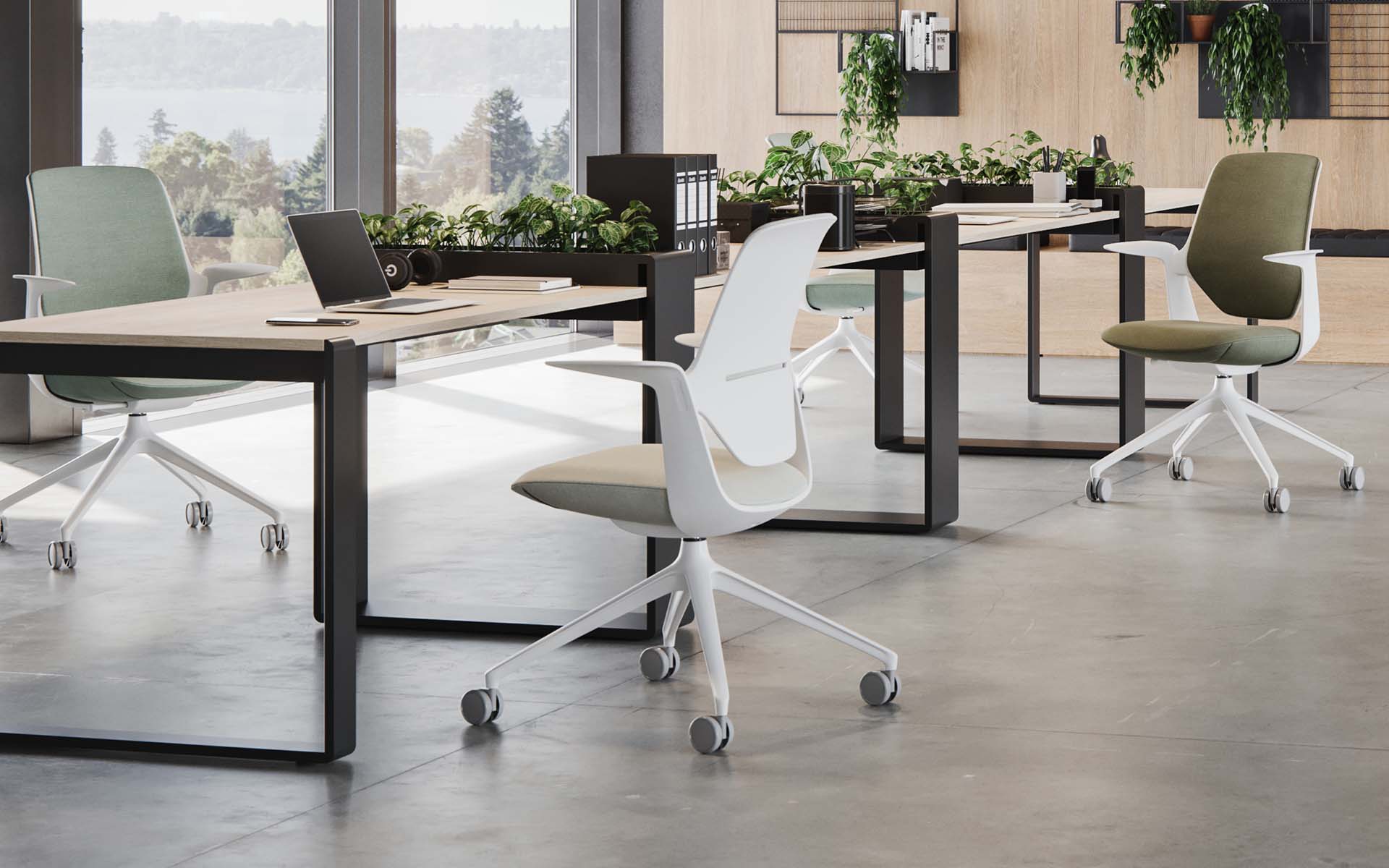 Three Profim Trillo Pro office chairs by ITO Design in sage, beige and moss at desks