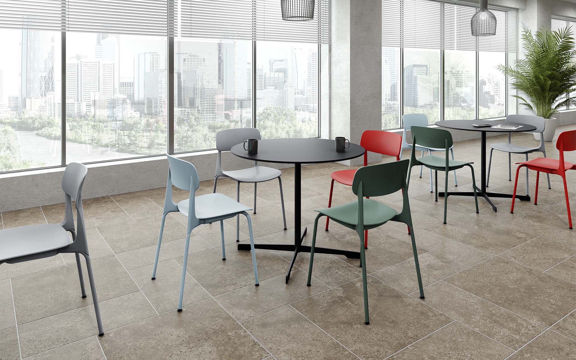 Okamura Ena visitor chairs in orange red, sage, dark grey and dark green around tables in a modern, spacious cafeteria