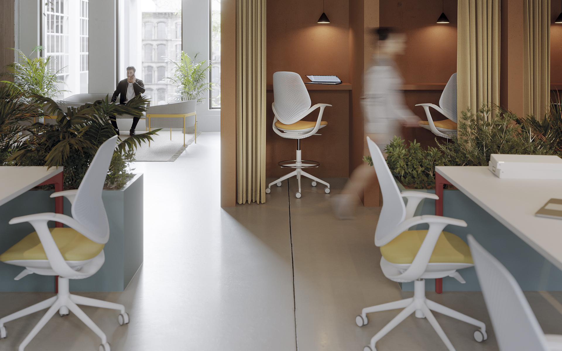 Lateral view of two Forma 5 Flow office chairs by ITO Design with padded seating surfaces in yellow, back and armrests in white and angled back view of two Flow office chairs with padded seating surfaces in orange, back and armrests in white and silver foot ring in a modern working environment with natural and artificial light.